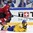 HELSINKI, FINLAND - DECEMBER 26: Sweden's Joel Eriksson Ek #20 goes down after colliding with Switzerland's Fabian Heldner #27/// during preliminary round action at the 2016 IIHF World Junior Championship. (Photo by Matt Zambonin/HHOF-IIHF Images)


